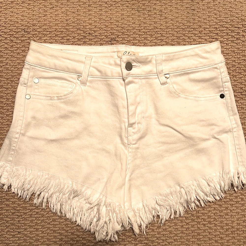 White frayed shorts